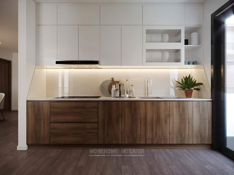 Kiến trúc sư đã thiết kế một phòng bếp khoa học tiên tiến và đầy đủ tiện nghi cho căn chung cư cao cấp.